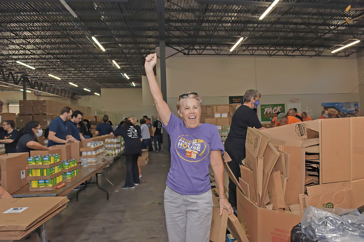 Volunteers pack 15,000 holiday meal boxes at Treasure Coast Food Bank’s Pack the House
